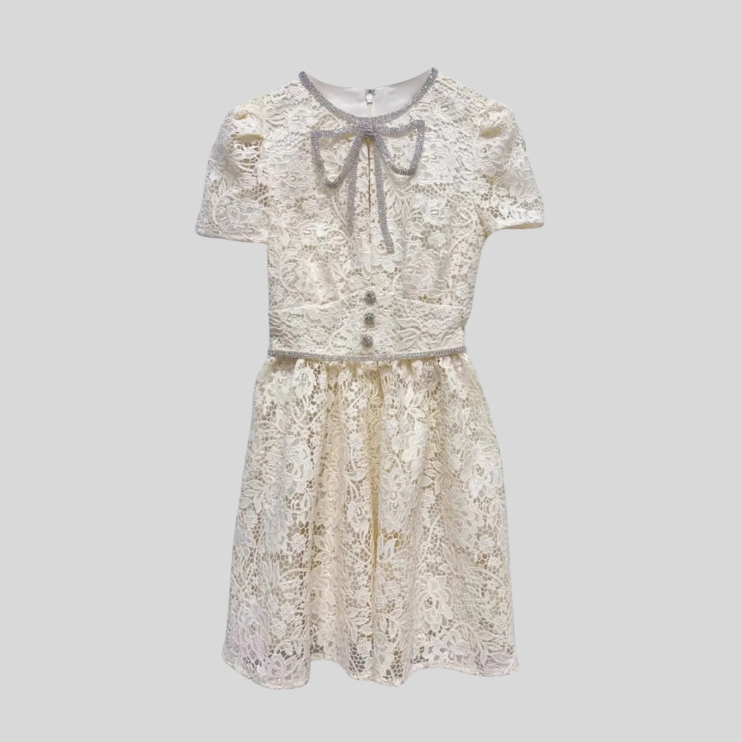 Short Sleeved Lace Dress With Rounded Neckline And Decorative Bow - Ivory