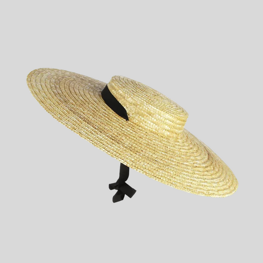 Wide-Brimmed Straw Hat With Black Ribbon Accent